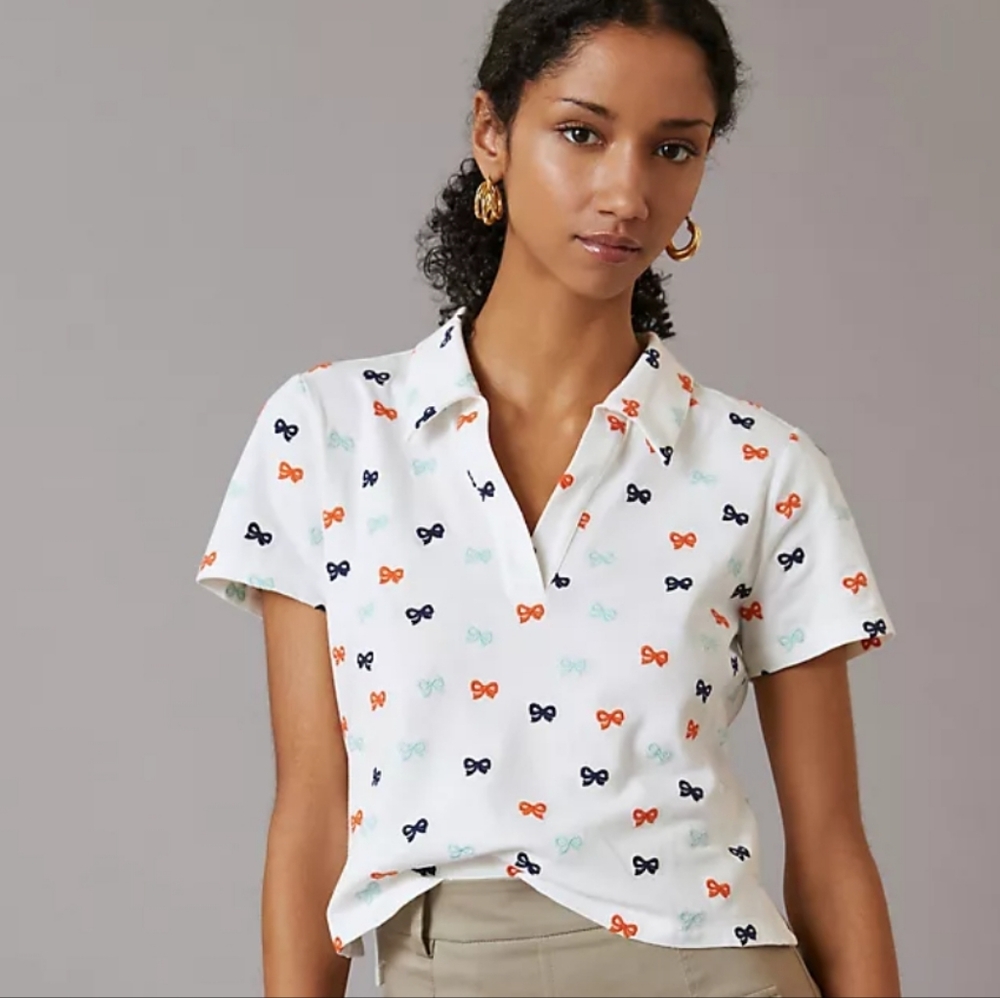 Anthropologie White Polo Shirt with Multicolor Bow Pattern